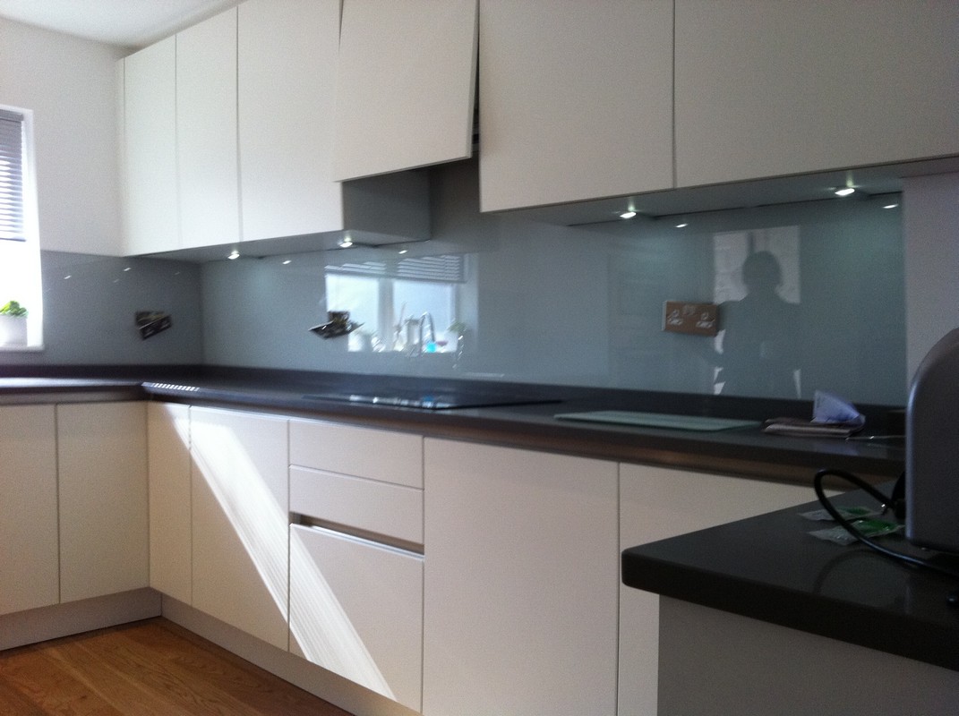 Grey glass kitchen splashback with LED lighting in Wimbledon