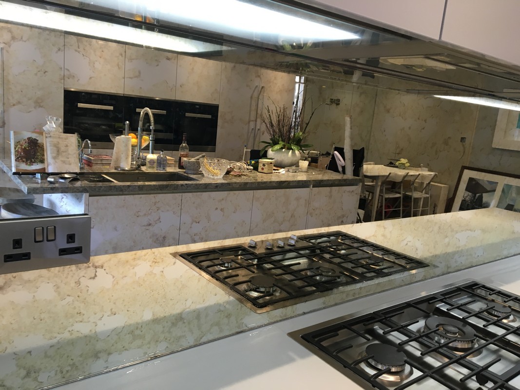 Mirror glass splashback in Wimbledon luxury kitchen